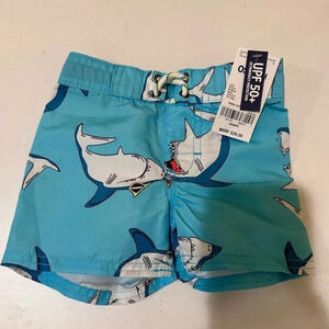 NWT Carters- shark swim trunks 0-3 months